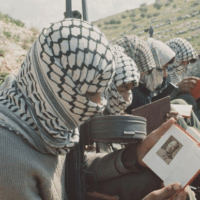 Palestinian guerrilla fighters in Jordan studying Quotations from Chairman Mao Zedong, 1970